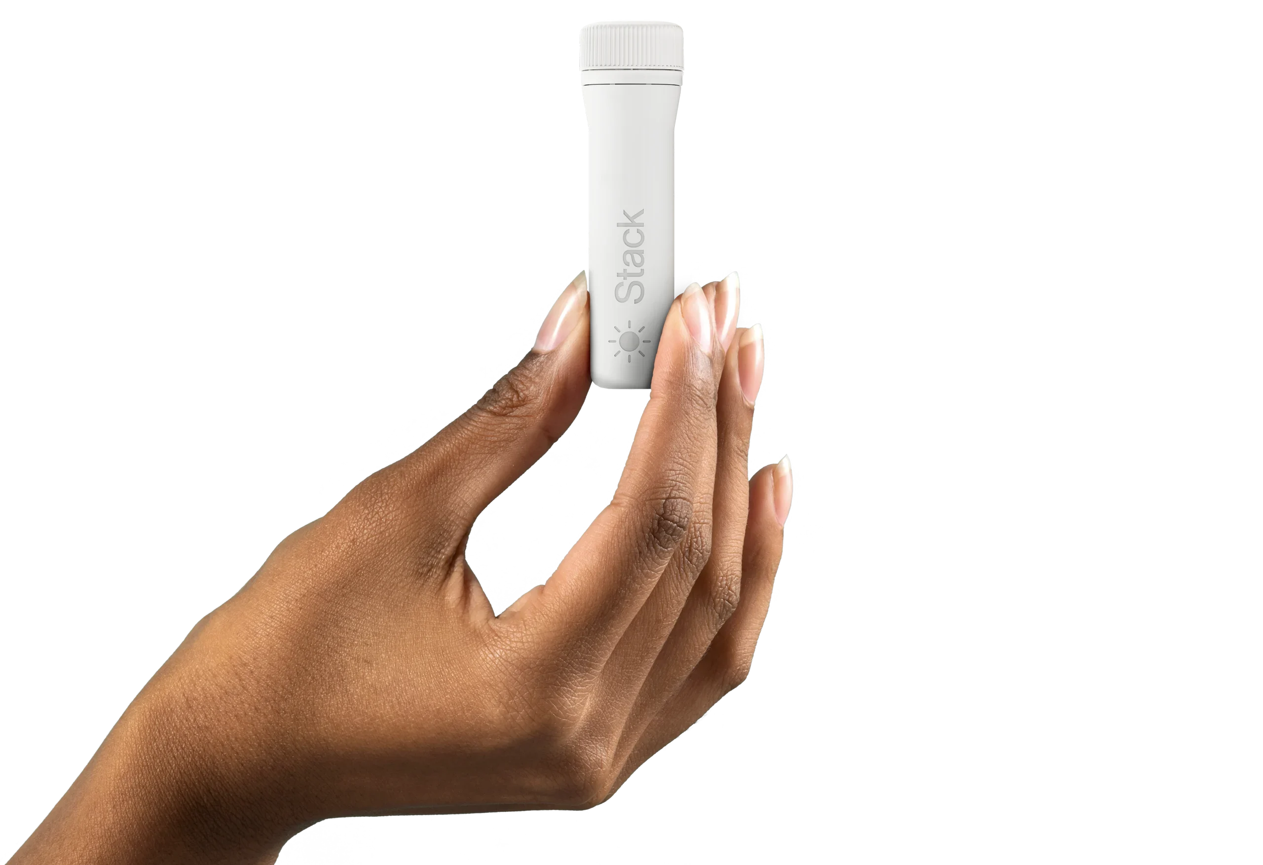 Hand holding Day Stack capsule